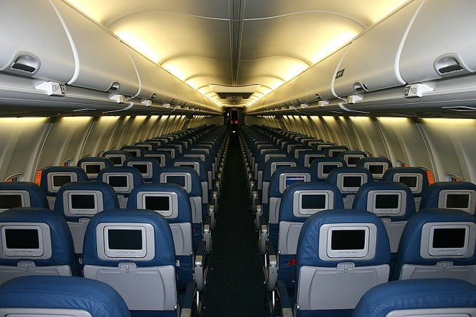 Tips memilih tempat duduk di pesawat